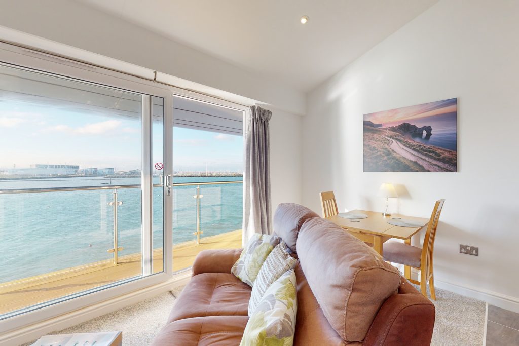 Indulge in the epitome of coastal luxury with this one-bedroom haven, perched gracefully on the waterfront.