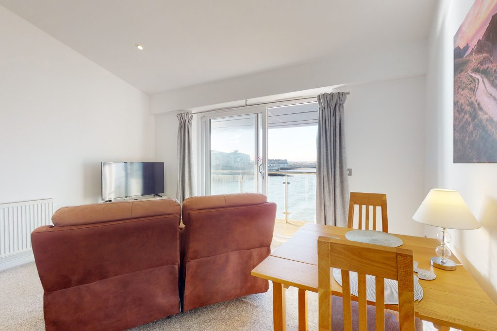Indulge in the epitome of coastal luxury with this one-bedroom haven, perched gracefully on the waterfront.