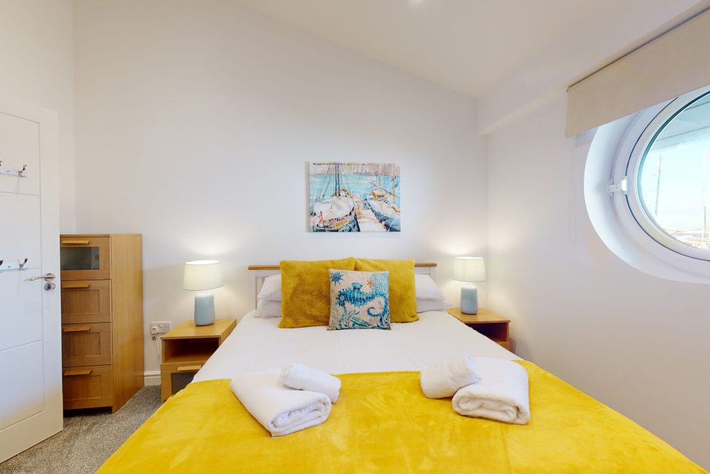 Indulge in the epitome of coastal luxury with this one-bedroom haven, perched gracefully on the waterfront.