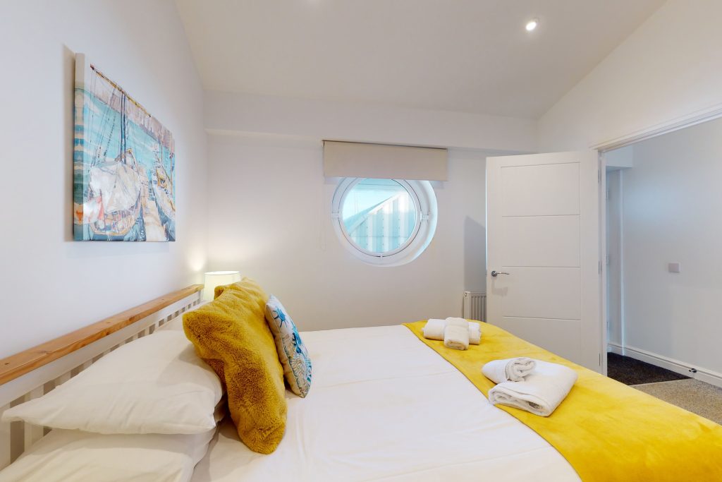 Indulge in the epitome of coastal luxury with this one-bedroom haven, perched gracefully on the waterfront.