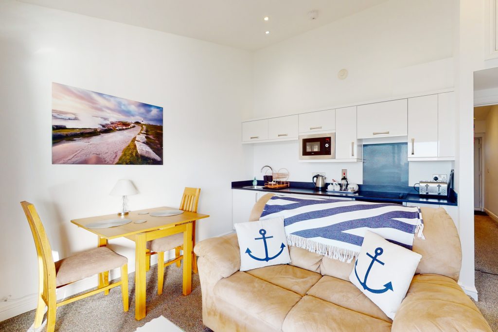 Embark on a swashbuckling escapade in this one-bedroom luxury haven, perched majestically on the water's edge.