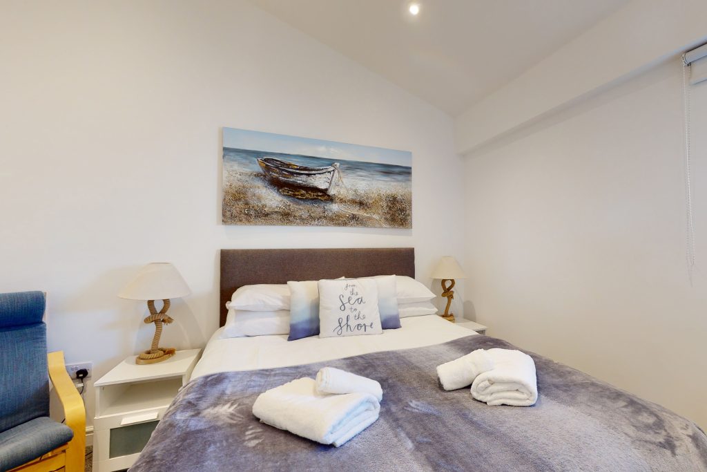 Embark on a swashbuckling escapade in this one-bedroom luxury haven, perched majestically on the water's edge.