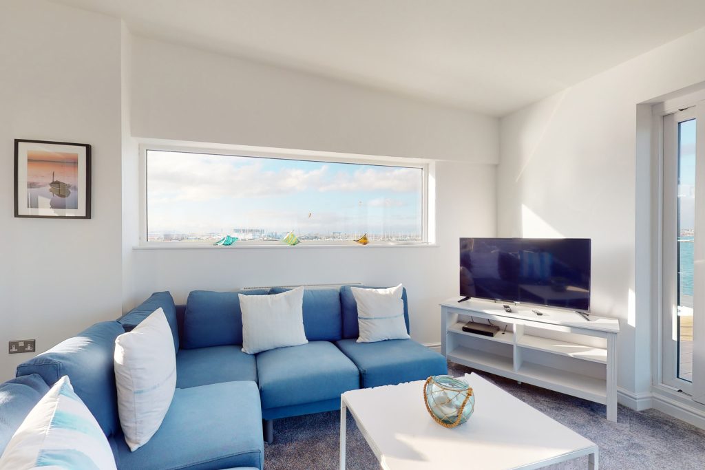 Perched on the waterfront, overlooking the harbour and marina, the apartment boasts one of the most captivating vistas in the county.
