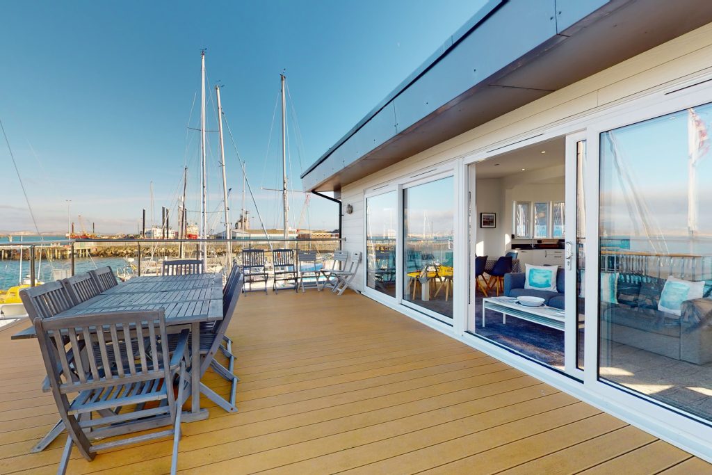 Perched on the waterfront, overlooking the harbour and marina, the apartment boasts one of the most captivating vistas in the county.