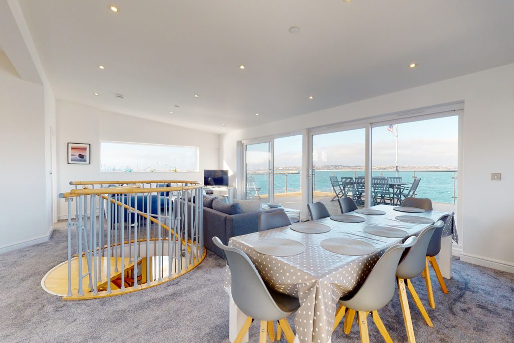 Perched on the waterfront, overlooking the harbour and marina, the apartment boasts one of the most captivating vistas in the county.