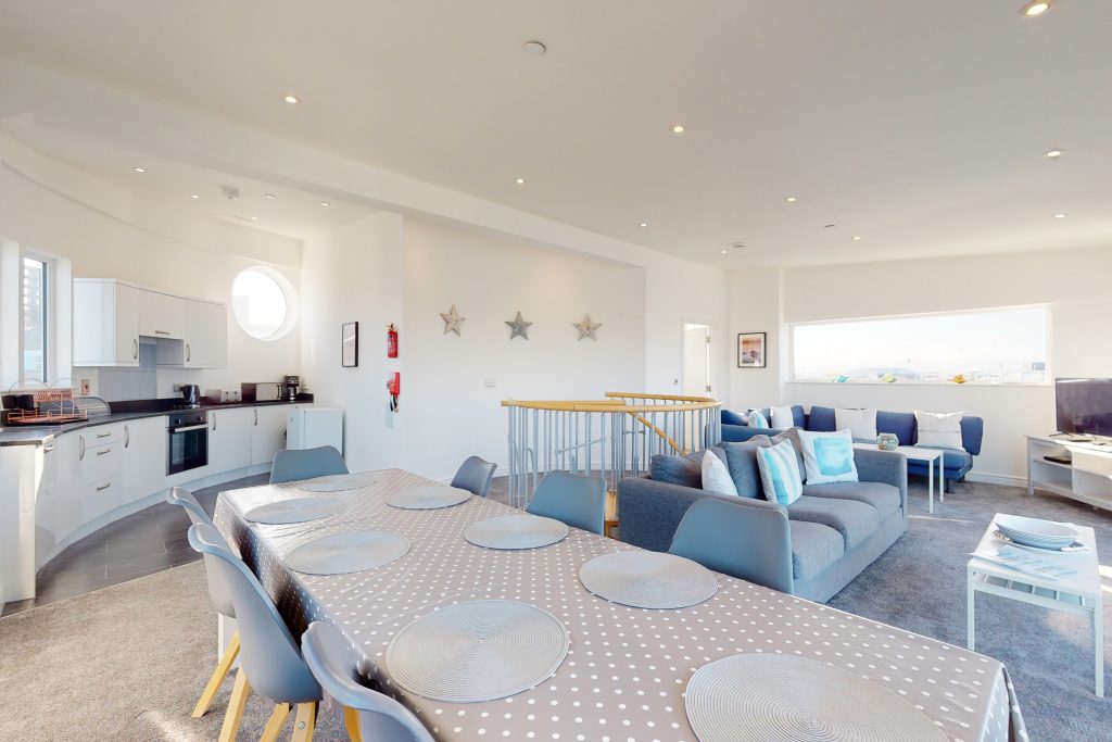 Perched on the waterfront, overlooking the harbour and marina, the apartment boasts one of the most captivating vistas in the county.