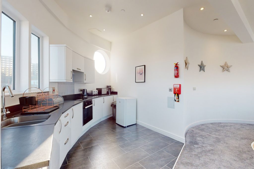 Perched on the waterfront, overlooking the harbour and marina, the apartment boasts one of the most captivating vistas in the county.