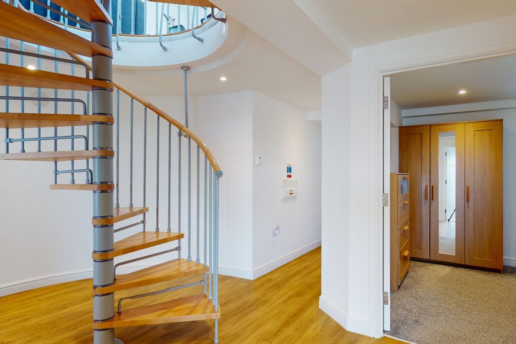 Perched on the waterfront, overlooking the harbour and marina, the apartment boasts one of the most captivating vistas in the county.