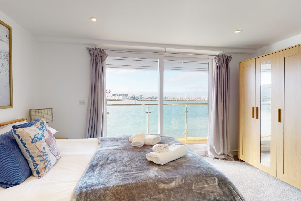 Perched on the waterfront, overlooking the harbour and marina, the apartment boasts one of the most captivating vistas in the county.
