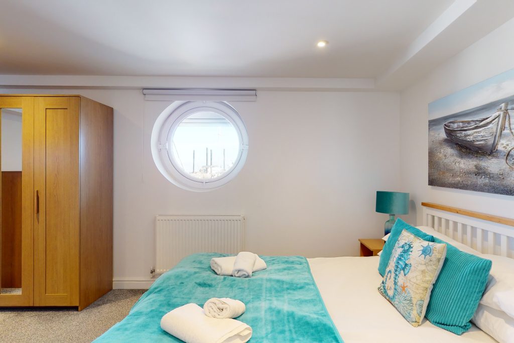 Perched on the waterfront, overlooking the harbour and marina, the apartment boasts one of the most captivating vistas in the county.