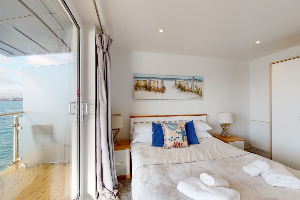 Perched on the waterfront, overlooking the harbour and marina, the apartment boasts one of the most captivating vistas in the county.