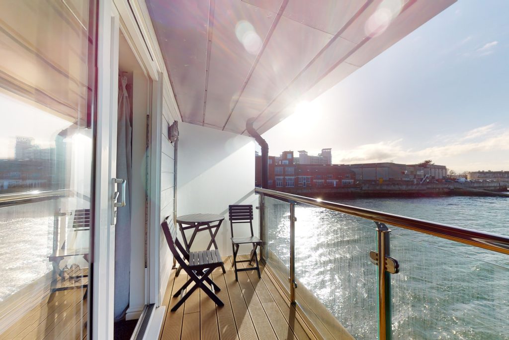 Perched on the waterfront, overlooking the harbour and marina, the apartment boasts one of the most captivating vistas in the county.