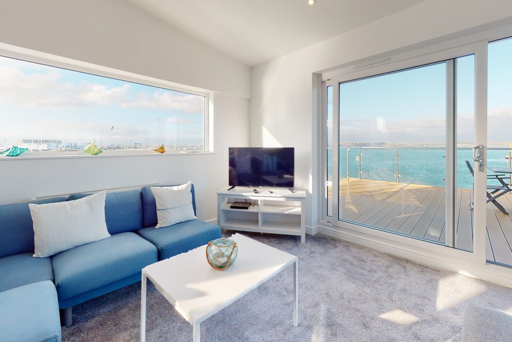 Perched on the waterfront, overlooking the harbour and marina, the apartment boasts one of the most captivating vistas in the county.
