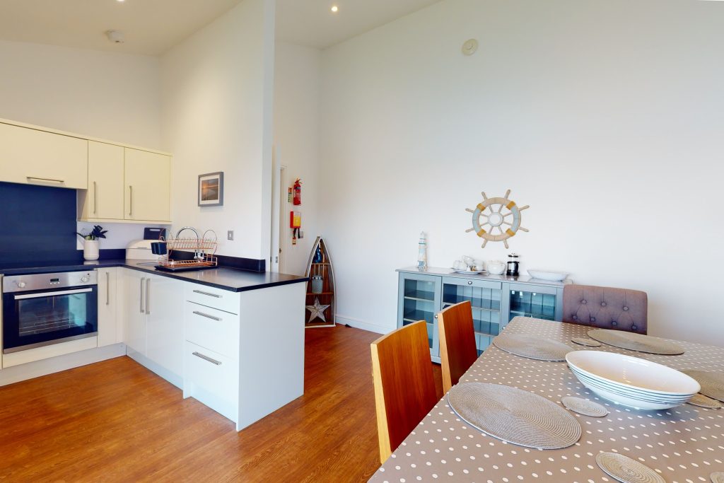 Nestled by the water, Crabbers' Wharf provides a direct gateway to Chesil Beach; promising sun-drenched leisure or coastal escapades.
