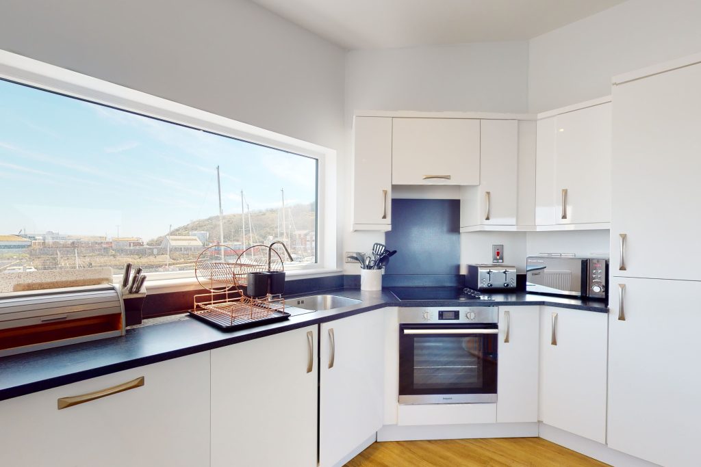 Step into the lap of luxury with this expansive three-bedroom apartment, poised majestically on the waterfront.