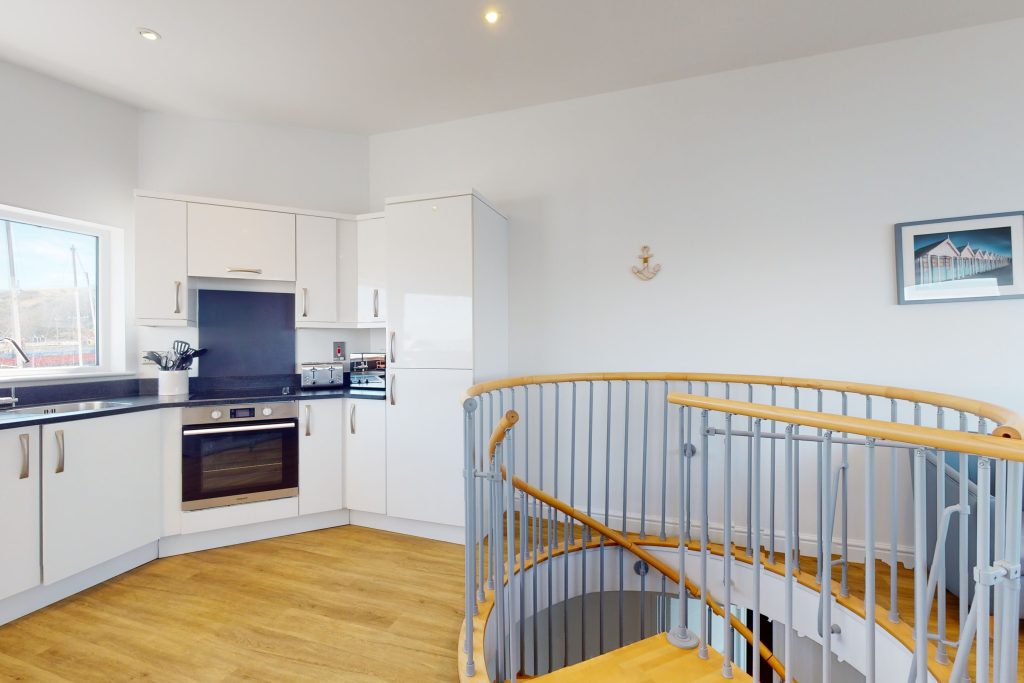 Step into the lap of luxury with this expansive three-bedroom apartment, poised majestically on the waterfront.