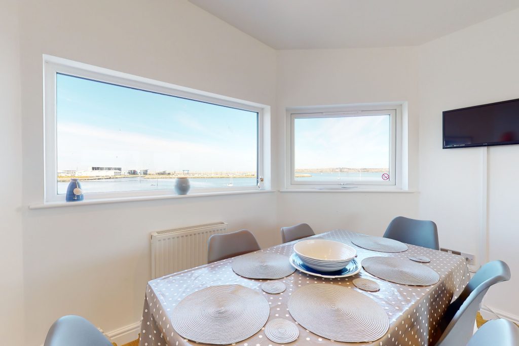 Step into the lap of luxury with this expansive three-bedroom apartment, poised majestically on the waterfront.