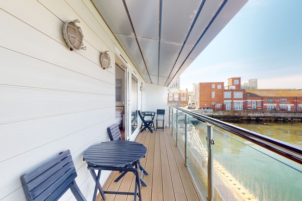 Step into the lap of luxury with this expansive three-bedroom apartment, poised majestically on the waterfront.