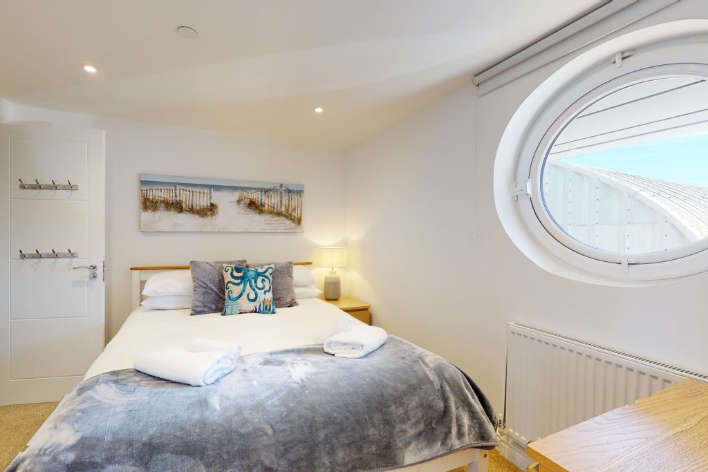 Step into the lap of luxury with this expansive three-bedroom apartment, poised majestically on the waterfront.