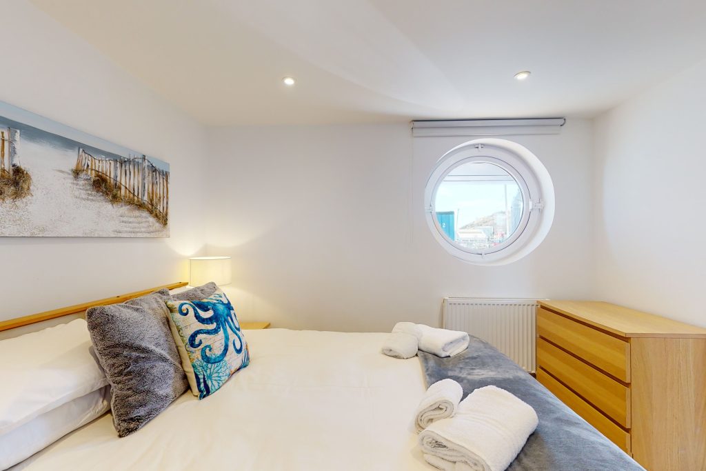 Step into the lap of luxury with this expansive three-bedroom apartment, poised majestically on the waterfront.
