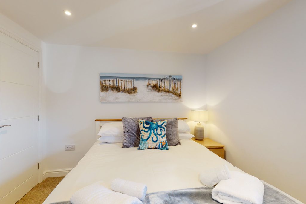 Step into the lap of luxury with this expansive three-bedroom apartment, poised majestically on the waterfront.