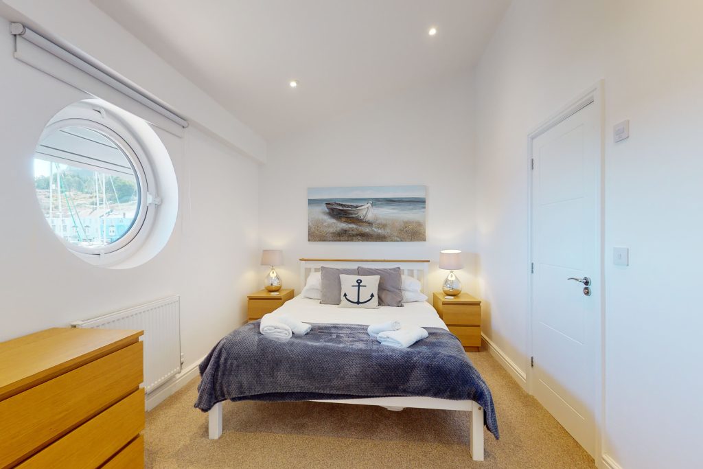 Step into the lap of luxury with this expansive three-bedroom apartment, poised majestically on the waterfront.