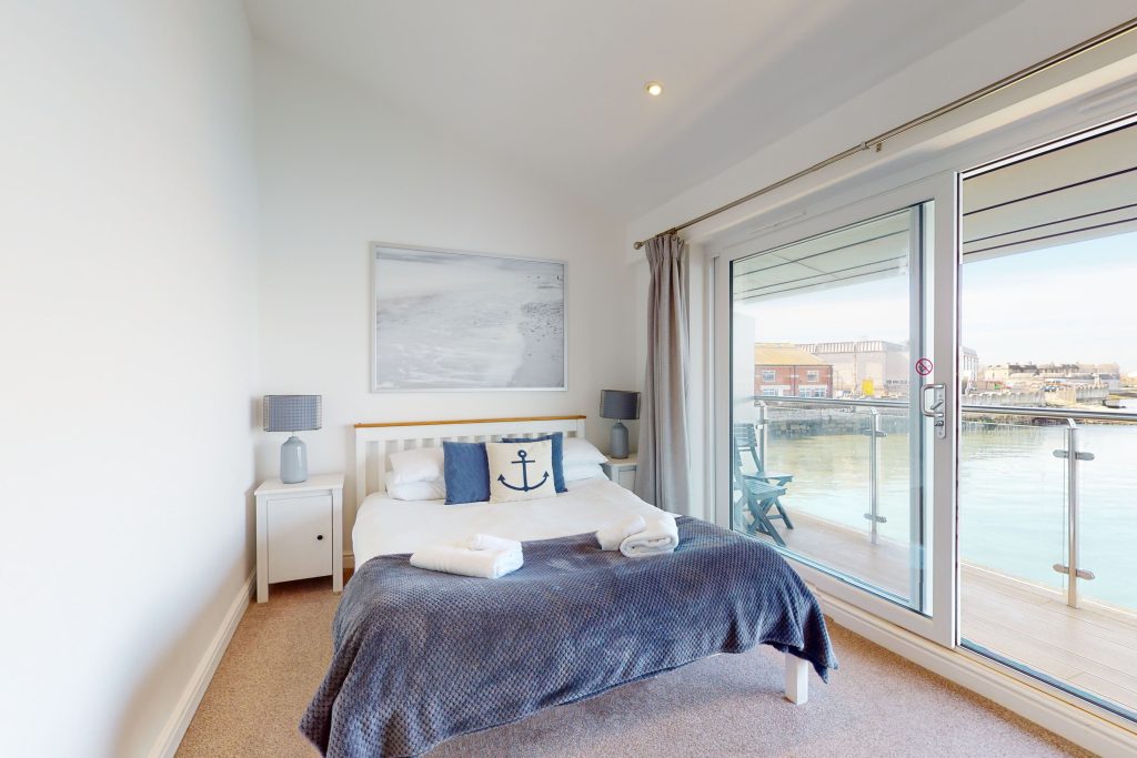 Step into the lap of luxury with this expansive three-bedroom apartment, poised majestically on the waterfront.