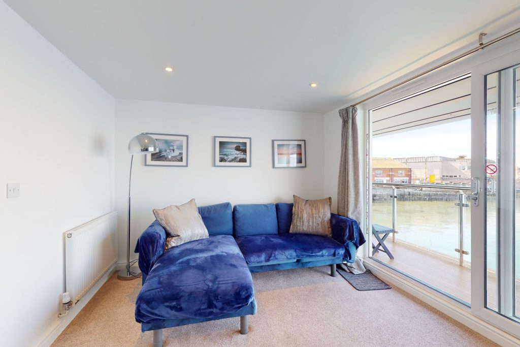 Step into the lap of luxury with this expansive three-bedroom apartment, poised majestically on the waterfront.