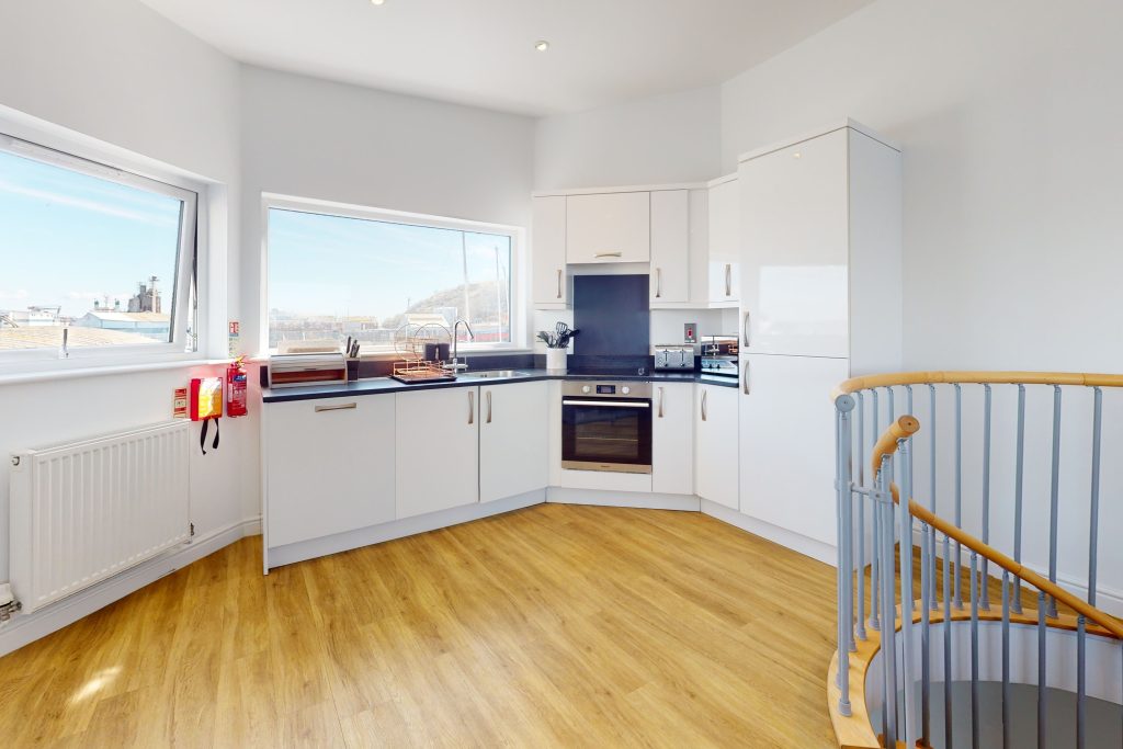 Step into the lap of luxury with this expansive three-bedroom apartment, poised majestically on the waterfront.