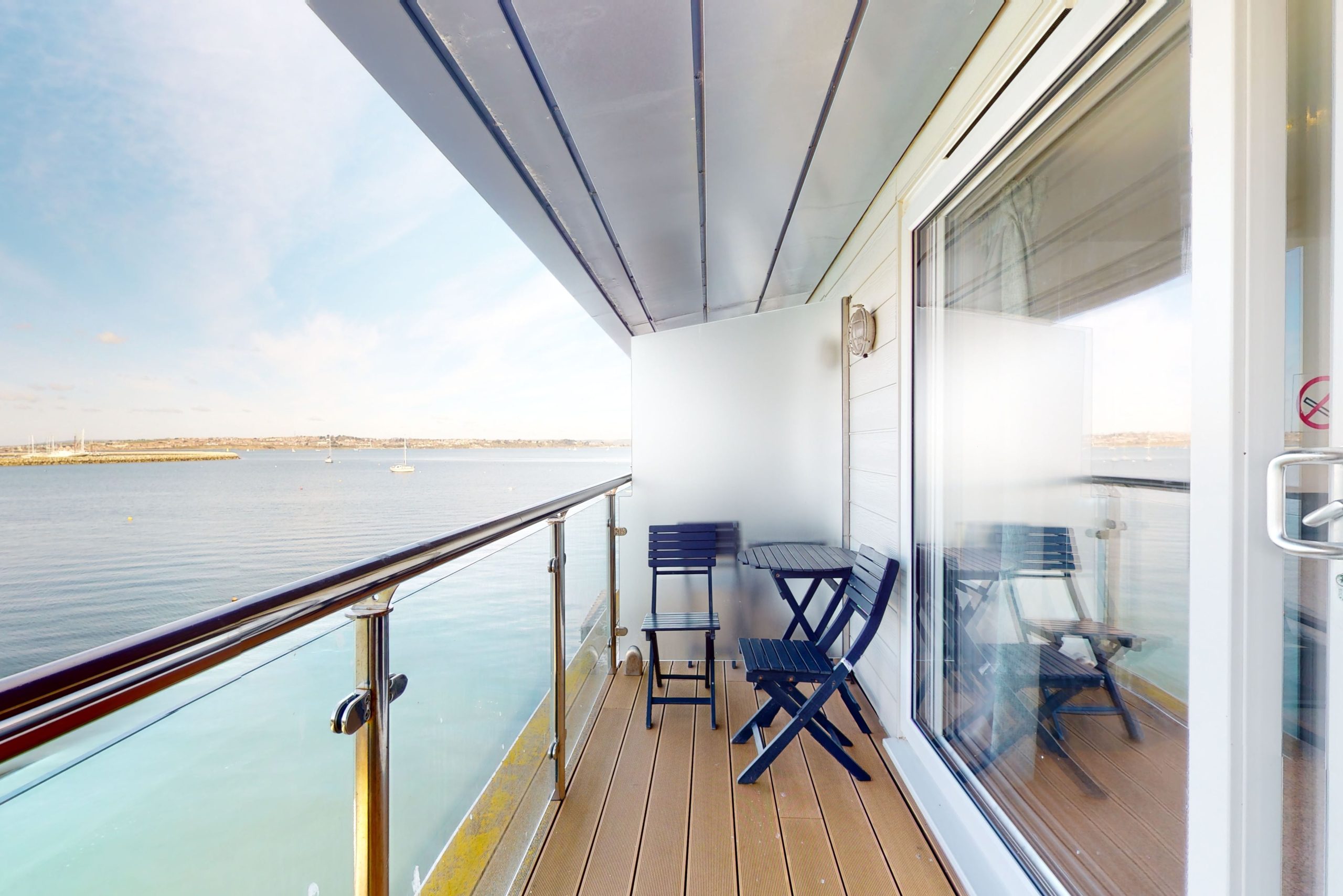 Step into the lap of luxury with this expansive three-bedroom apartment, poised majestically on the waterfront.