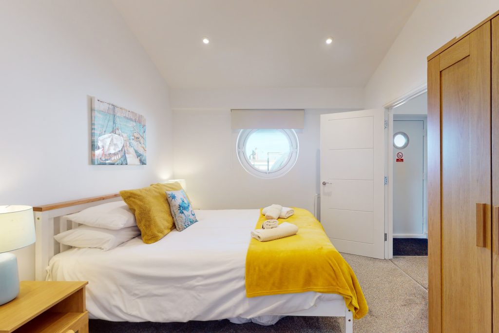 Indulge in the epitome of coastal luxury with this one-bedroom haven, perched gracefully on the waterfront.