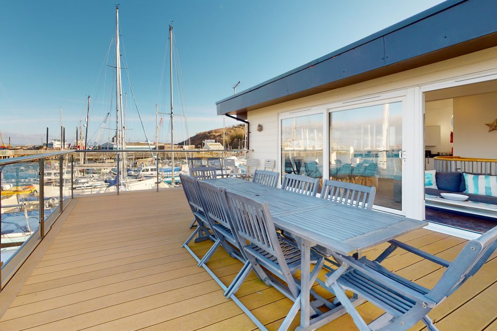 Perched on the waterfront, overlooking the harbour and marina, the apartment boasts one of the most captivating vistas in the county.