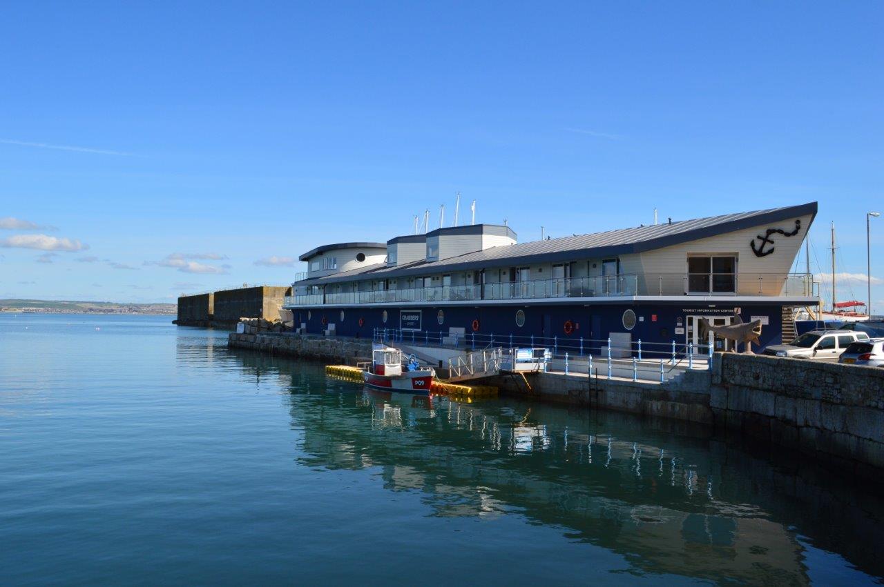 Nestled by the water, Crabbers' Wharf provides a direct gateway to Chesil Beach; promising sun-drenched leisure or coastal escapades.