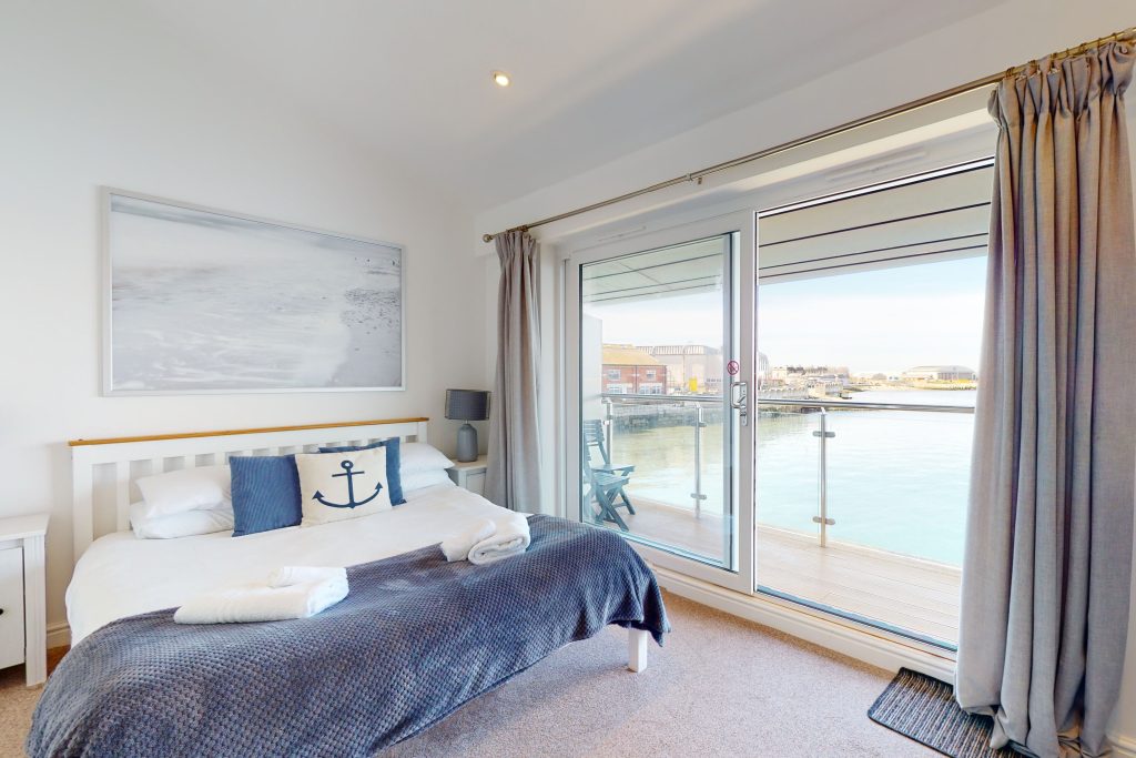 Step into the lap of luxury with this expansive three-bedroom apartment, poised majestically on the waterfront.